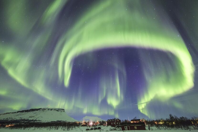 The Northern  Lights dance above Kilpisjärvi, Finland.