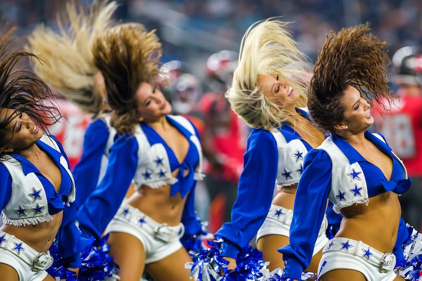 Dallas Cowboys cheerleaders perform during a timeout in the first half of the team's Aug. 29...