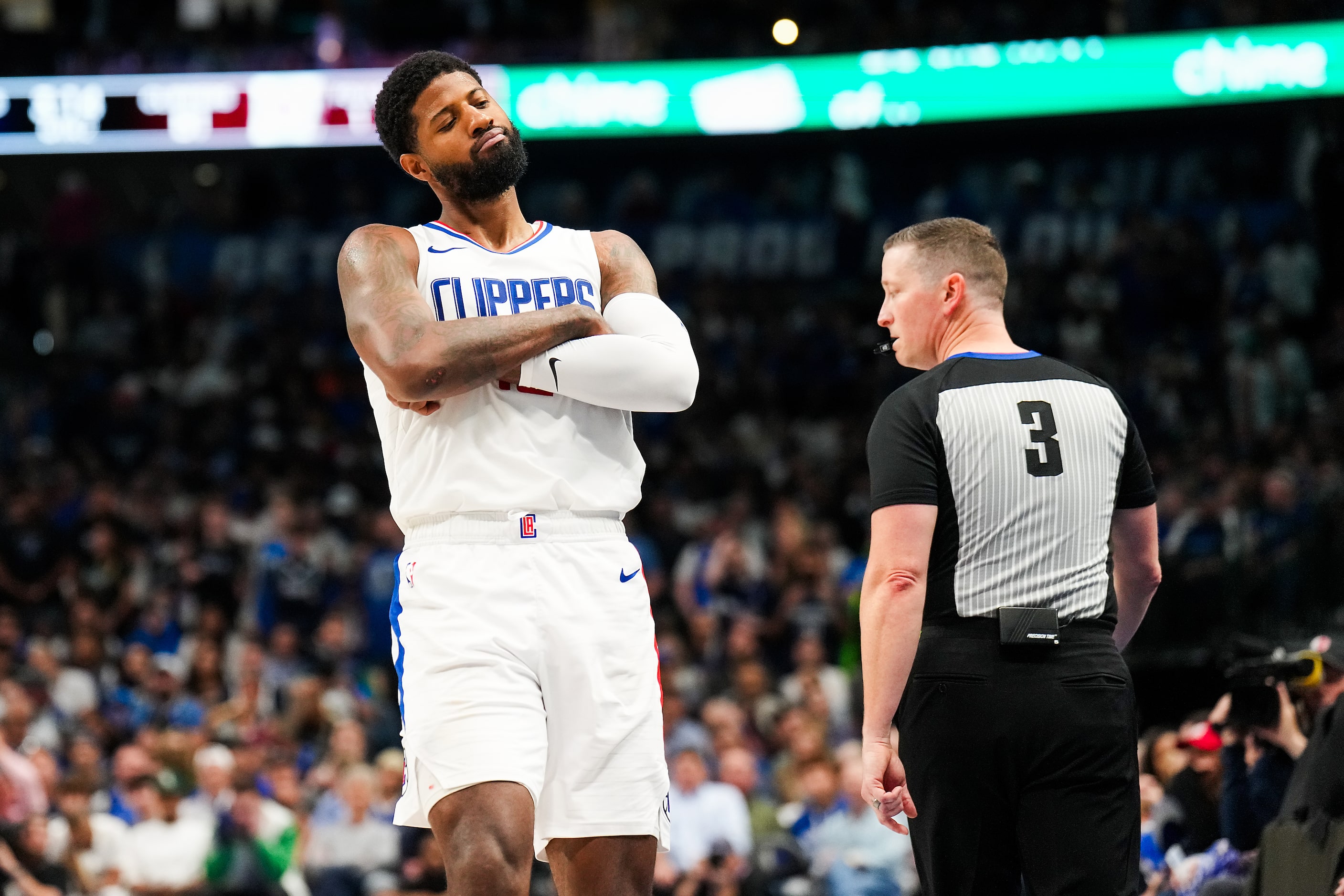 LA Clippers forward Paul George (13) strikes a pose after hitting a 3-pointer during the...