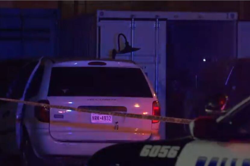Crime tape surrounds a storage unit where a stabbing victim was found Tuesday night in Old...