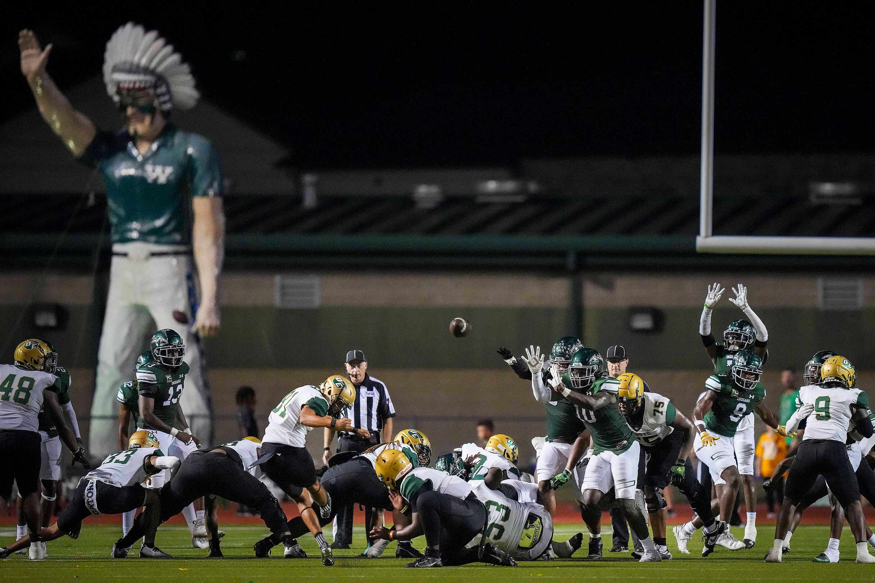 DeSoto  kicker Angel Diaz misses a 34-yard field goal attempt during the first half of a...