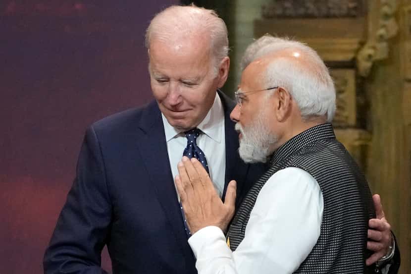 FILE - U.S. President Joe Biden, left, and India Prime Minister Narendra Modi talk during...