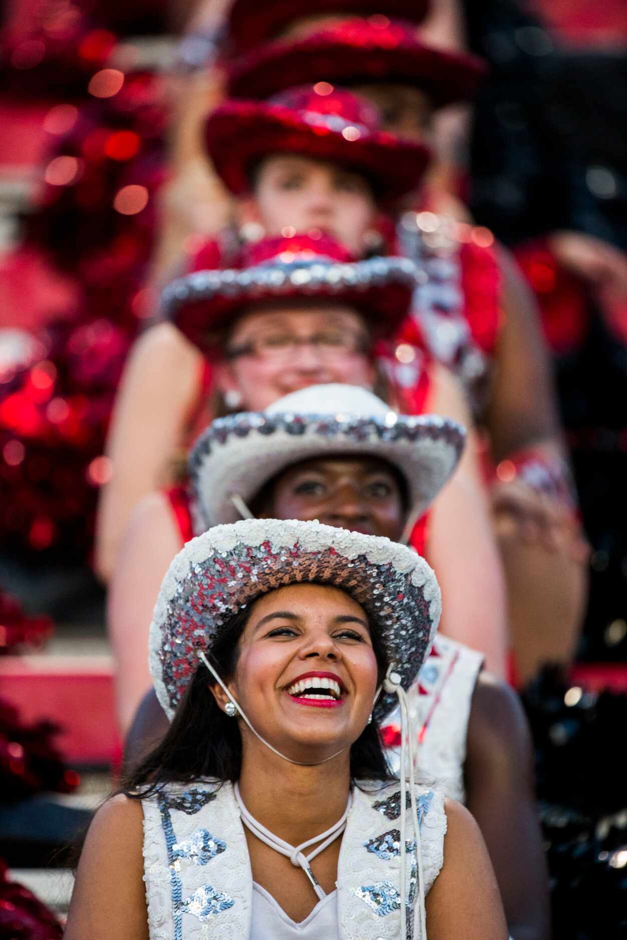 Arlington Martin dance team members watch the first quarter of their game against Skyline on...