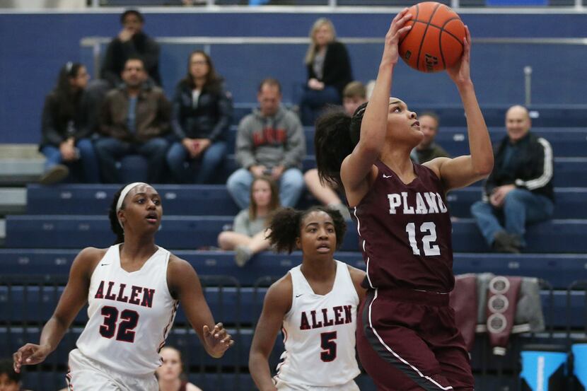Plano's Jordyn Merritt (12) takes a shot during a District 6-6A game against Plano on...