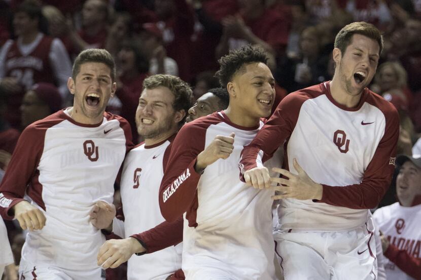 NORMAN, OK - MARCH 1: The Oklahoma bench reacts after scoring against Baylor during the...