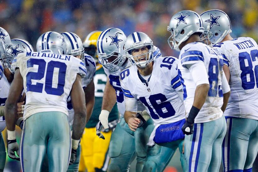 Dallas Cowboys quarterback Matt Cassel (16) calls a play in the huddle against the Green Bay...