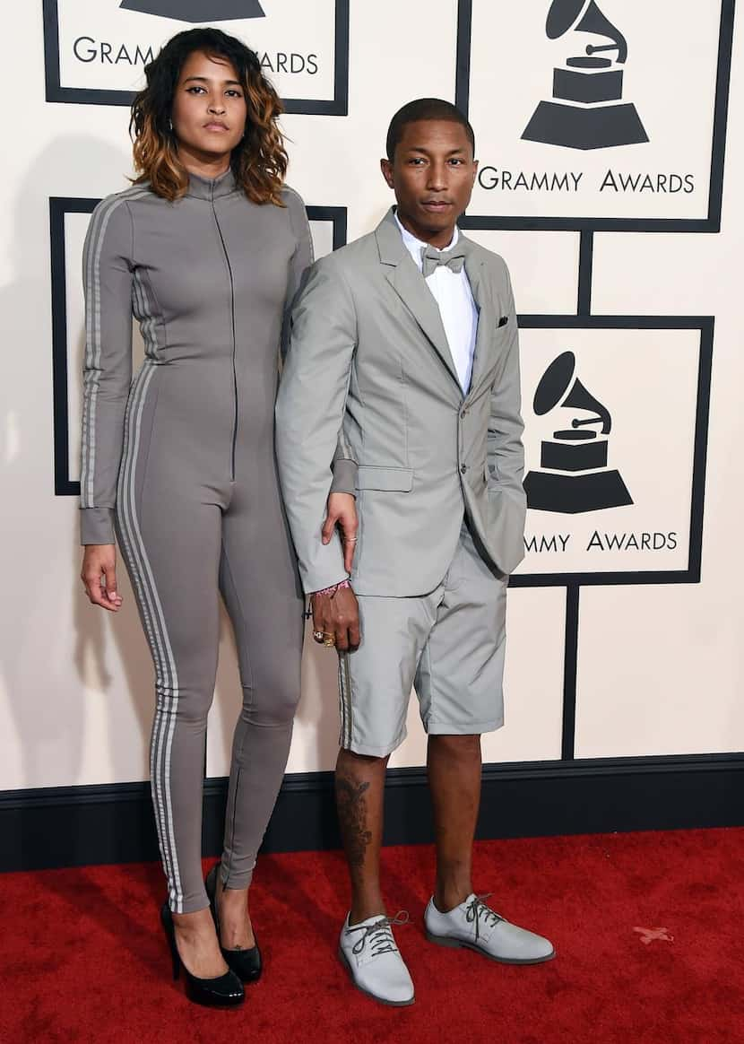 MISS: In head-to-toe Adidas, Pharrell Williams (with wife Helen Lasichanh) wore shorts that...