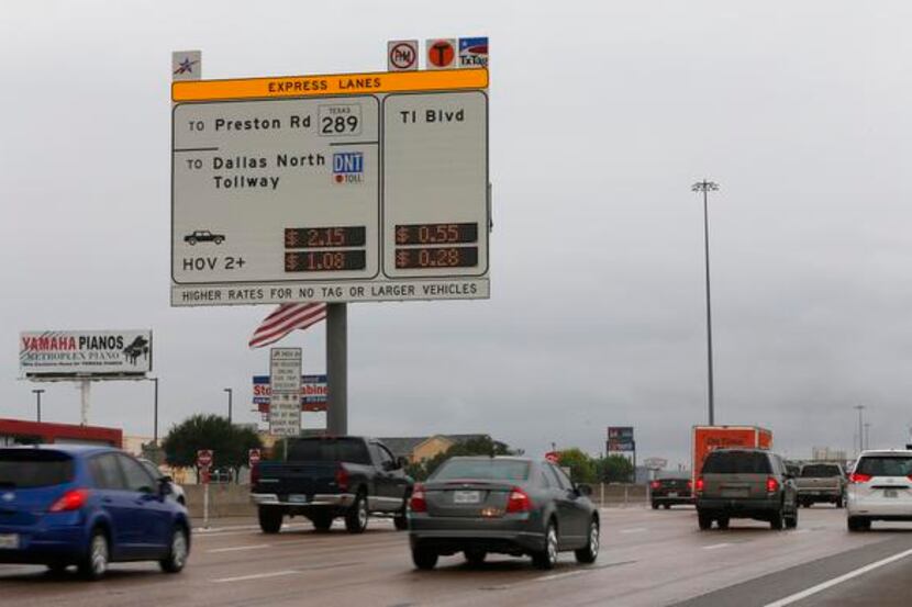 
A new sign posts the cost for travelers on the westbound lane of LBJ Freeway between...