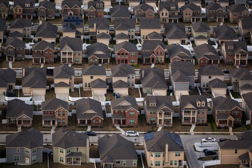 Rows of suburban homes are seen in an aerial view March 6 in Aubrey.
