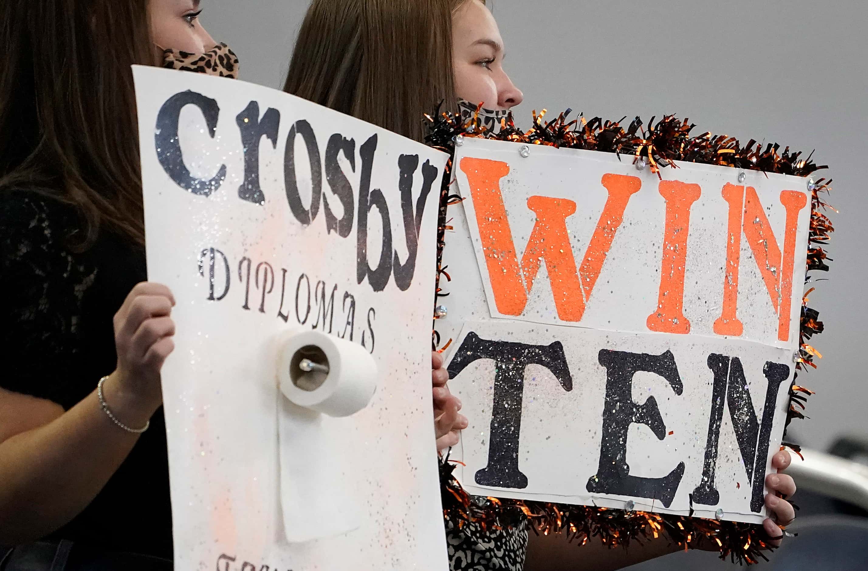 Aledo fans cheer their team during the second half of a 56-21 victory over Crosby to win the...