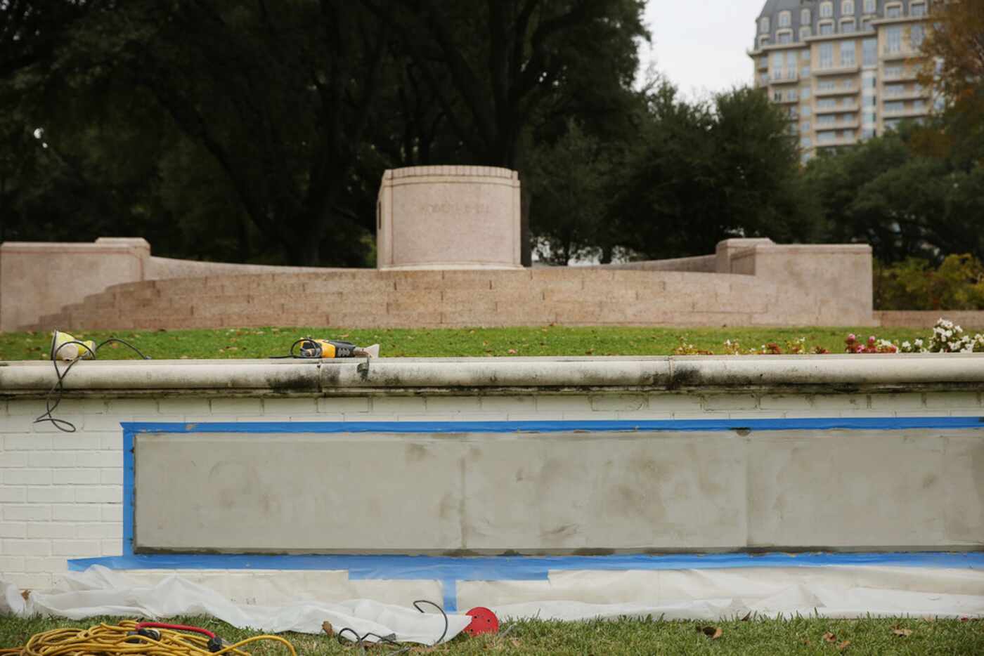 A view of where workers covered over a sign denoting the former "Robert E. Lee Park" at the...