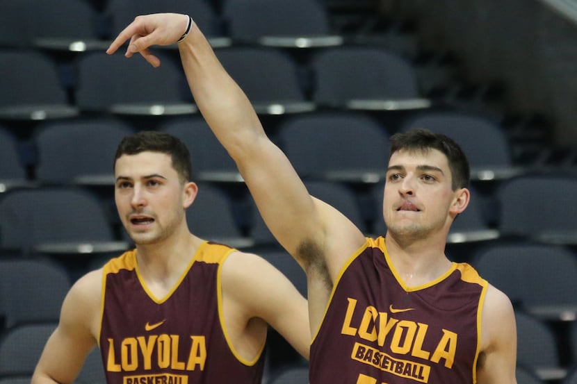 Loyola Ramblers guards Ben Richardson (14) and  Clayton Custer (13) are pictured together...