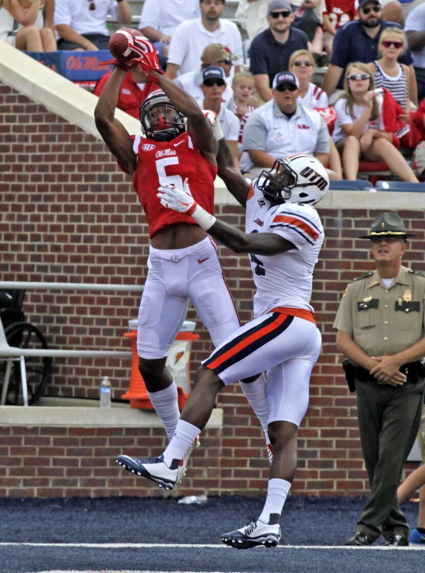 OXFORD MS -SEPTEMBER 5:  Wide receiver DaMarkus Lodge #5 of the Mississippi Rebelscatches a...