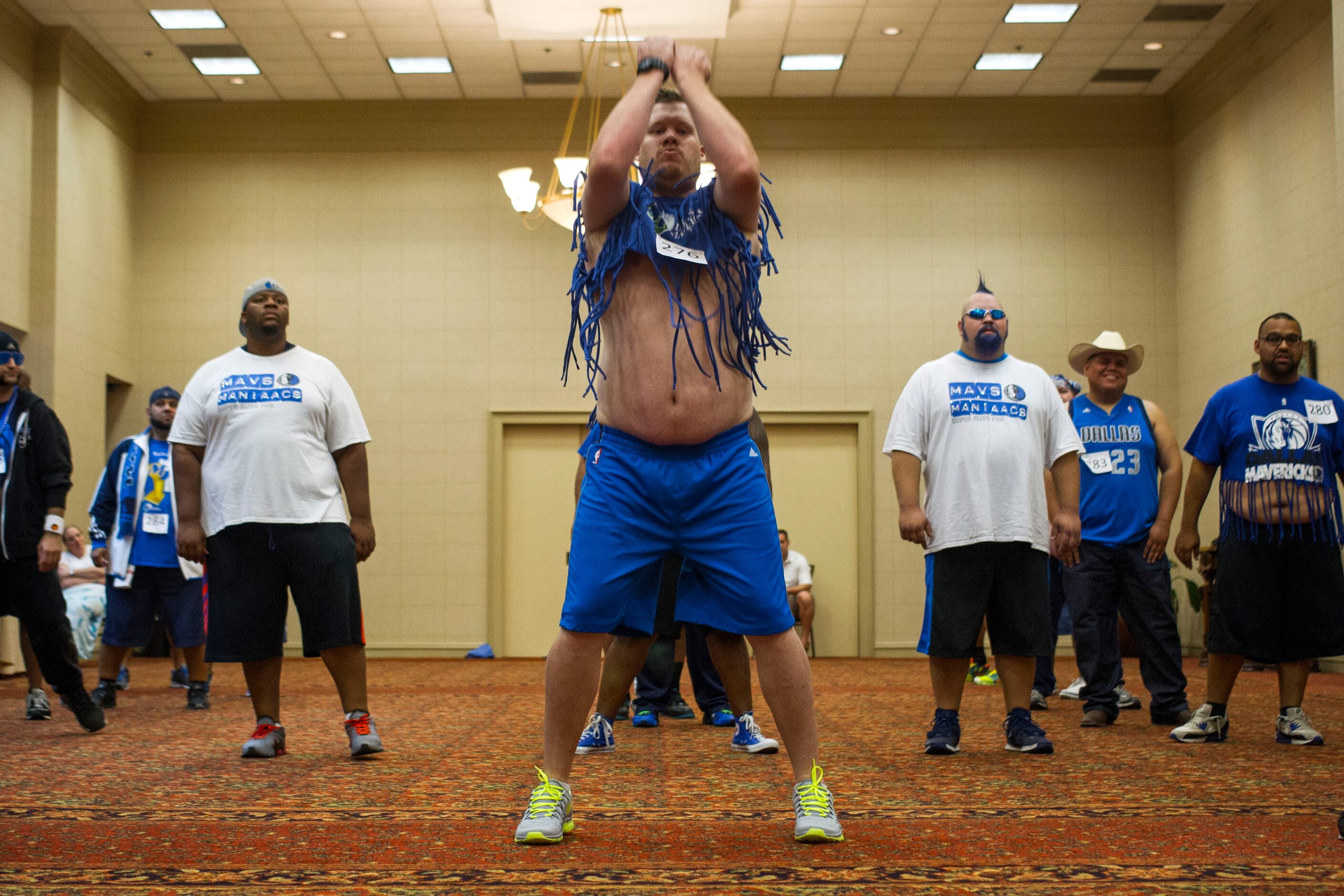 Ryan Walker, of Lewisville, performs for judges during The Mavs ManiAACs tryouts, which were...