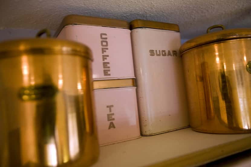 A view of vintage canisters owned by the Higginbothams. Lee and Melissa Higginbotham own a...