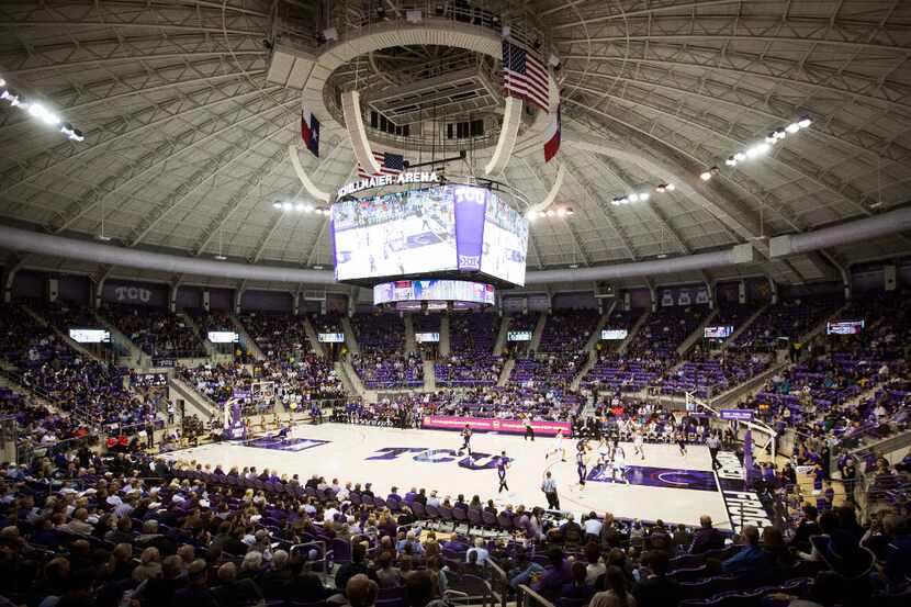 TCU faces Washington during the first half of an NCAA basketball game at Ed and Rae...