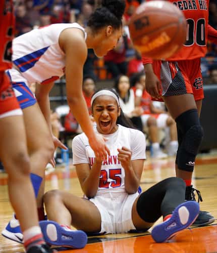 Duncanville's Deja Kelly (25) exhaults after drawing a foul while making a shot against...