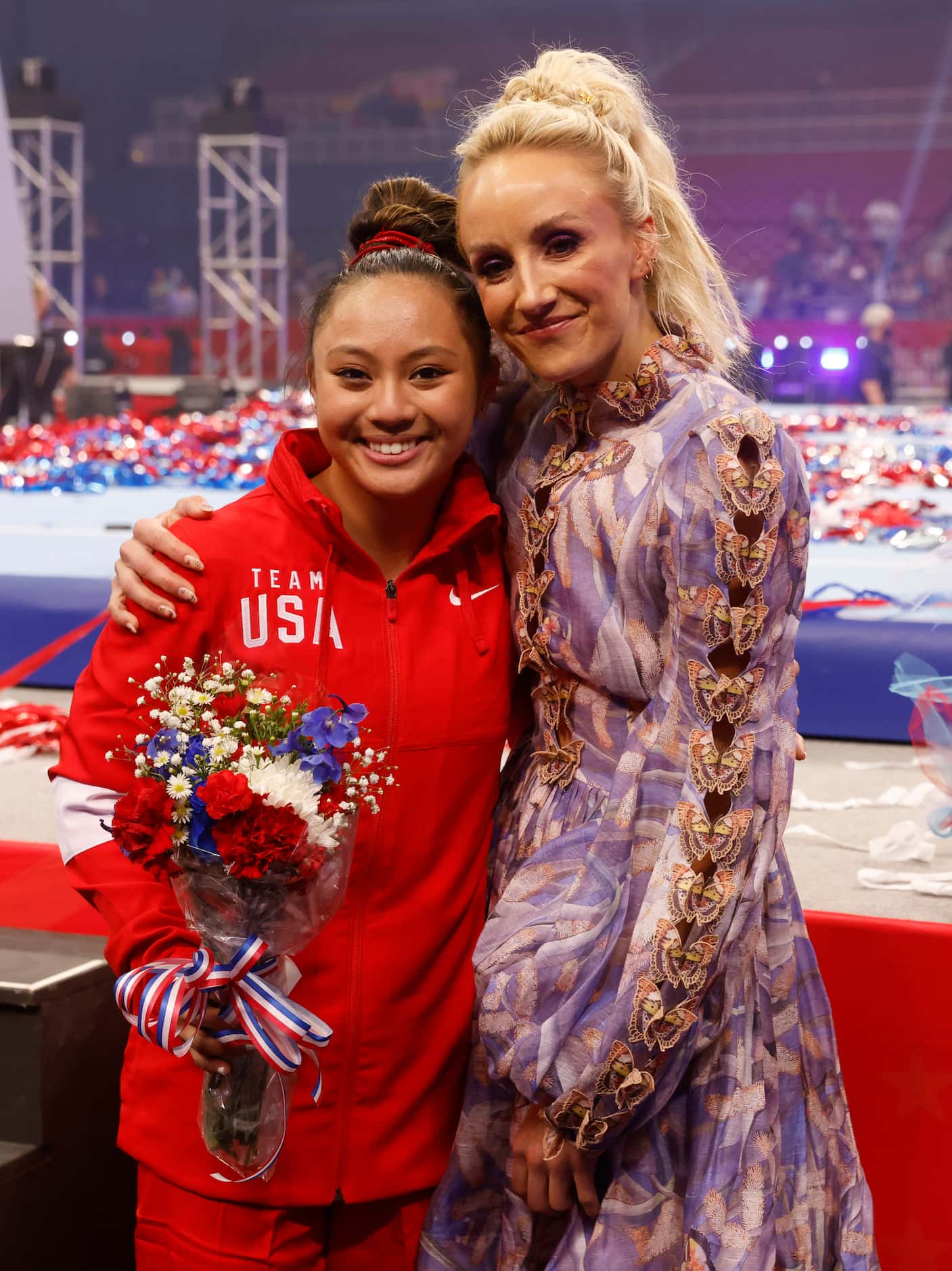 Emma Malabuyo and Nastia Liukin take a hug together after day 2 of the women's 2021 U.S....