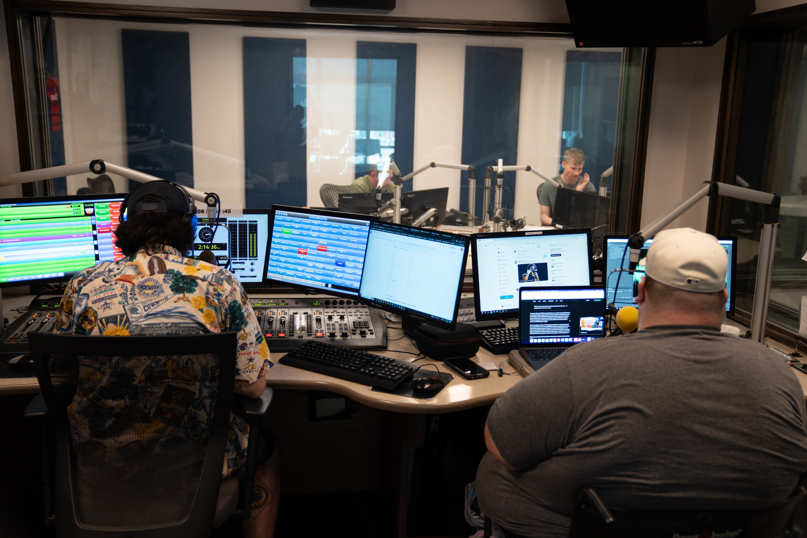 Justin Montemayor (right) talks with David Mino and Sean Bass on air during the Ticket in...