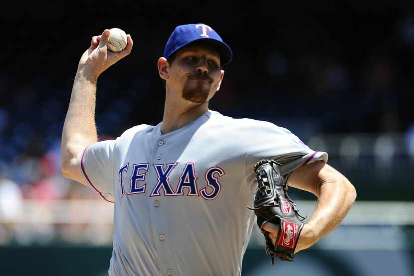 May 31, 2014; Washington, DC, USA; Texas Rangers starting pitcher Nick Tepesch (23) throws...