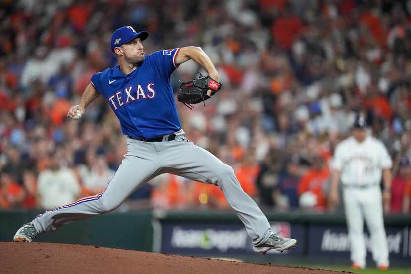 Texas Rangers starting pitcher Max Scherzer (31) pitches against the Houston Astros in the...