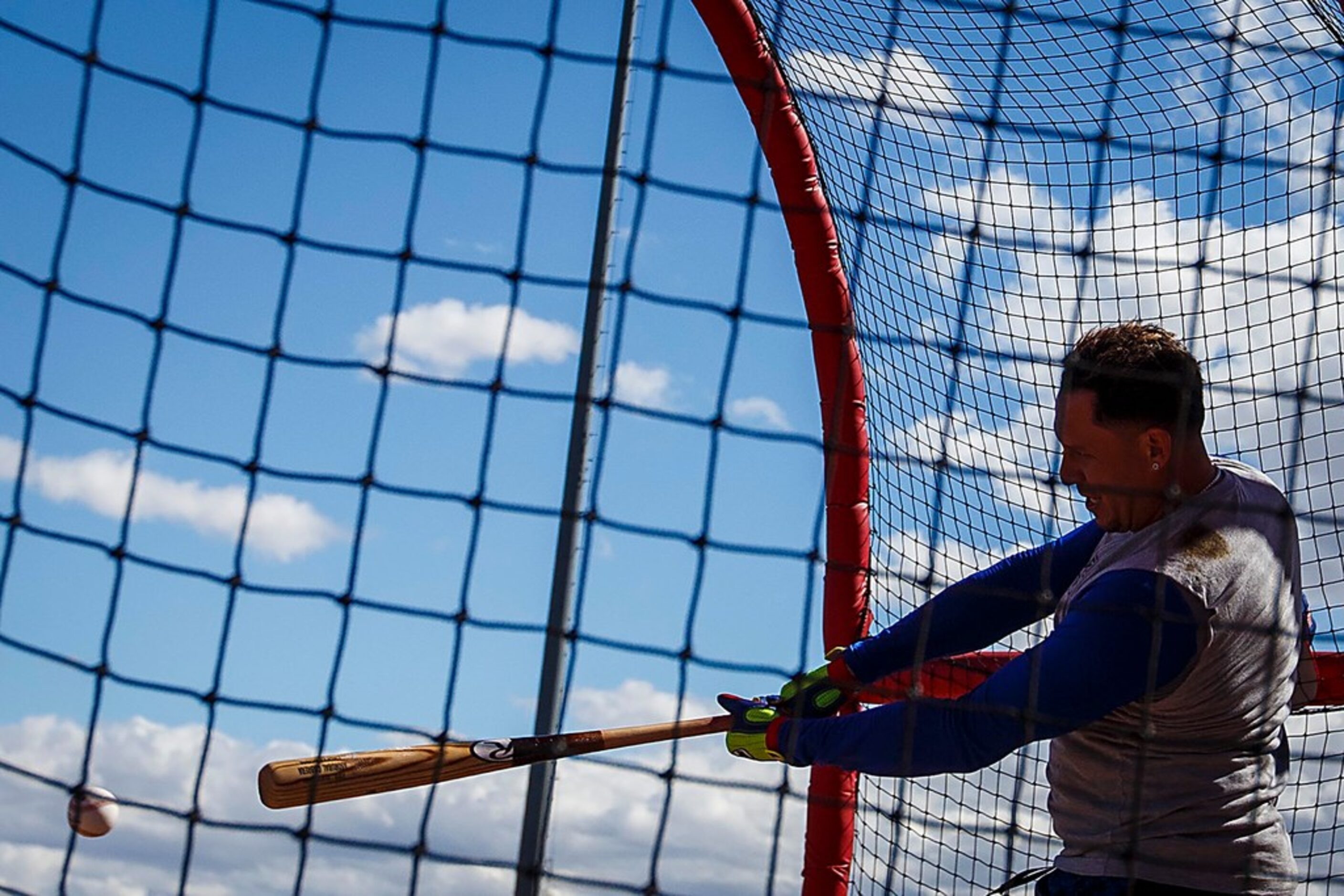 Texas Rangers infielder Asdrubal Cabrera takes batting practice during a spring training...