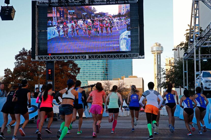 The elite woman's half marathon starts during the BMW Dallas Marathon in downtown Dallas on...