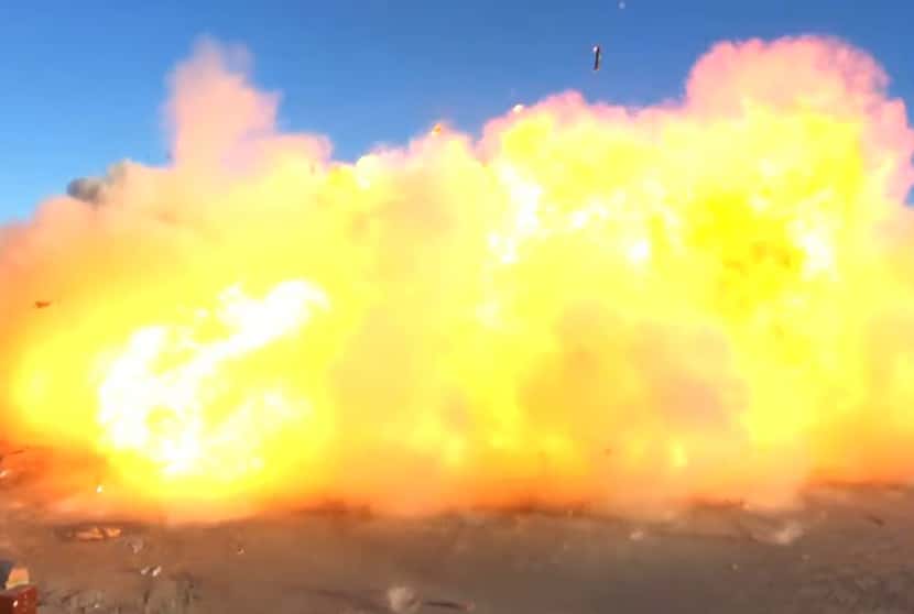 This SpaceX video frame grab image shows SpaceX's Starship SN8 rocket prototype crashing on...