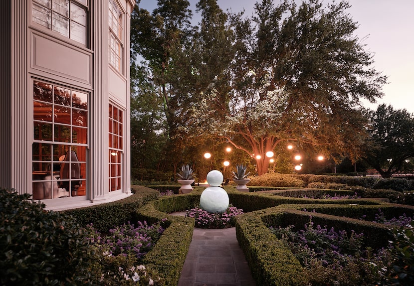 A sculpture by artist Gary Hume is the focal point of the parterre garden.