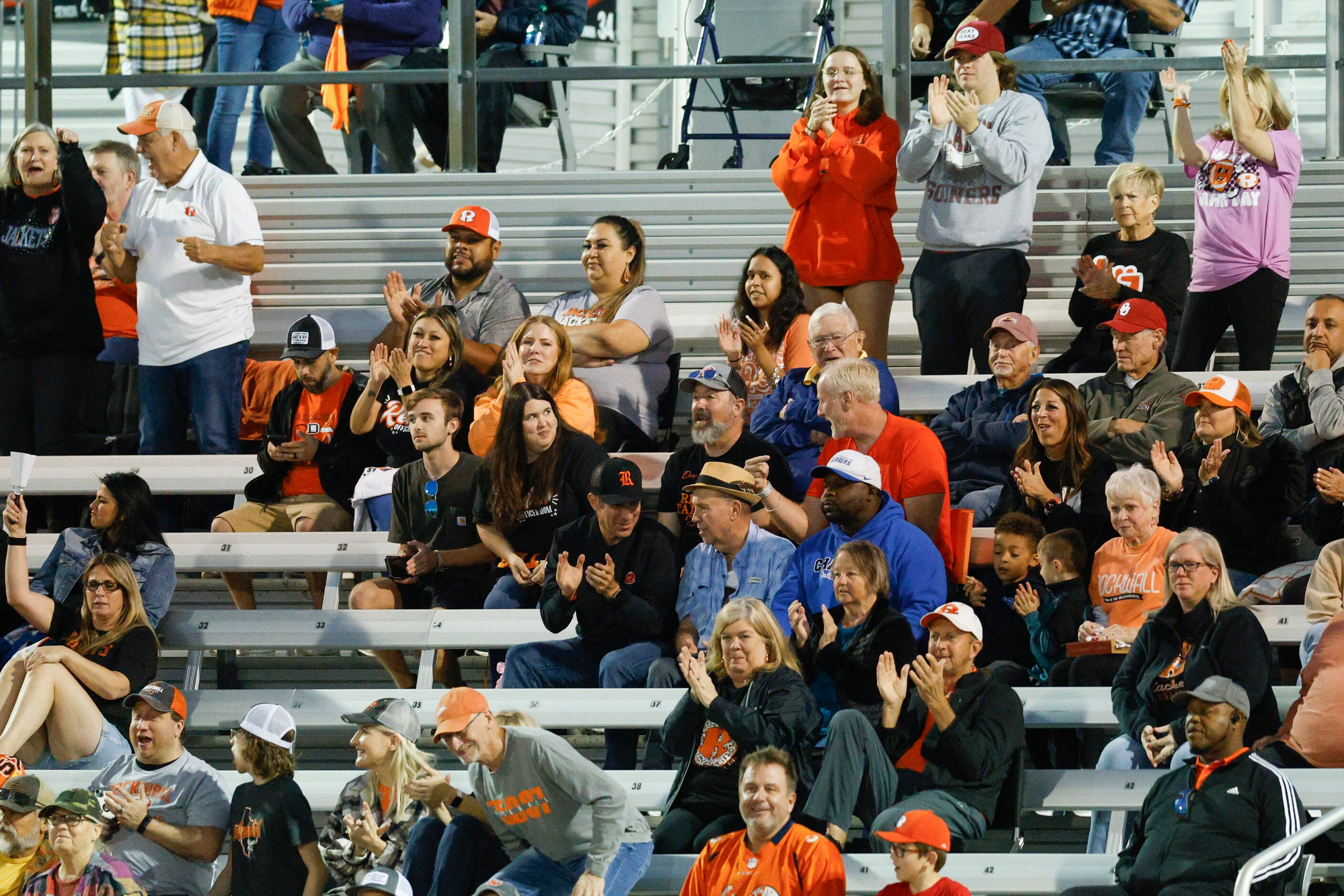 Rockwall fans celebrate after a touchdown during the first half of a District 10-6A game...