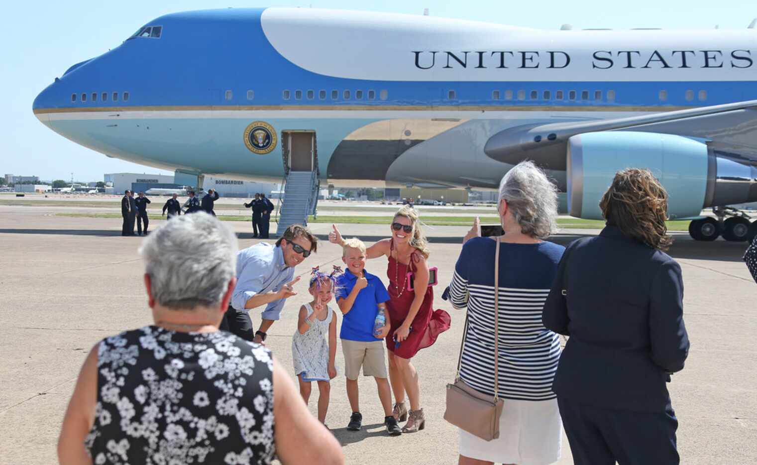 The Knutowski family from Trophy Club, Texas, poses for a photo in front of Air Force One...
