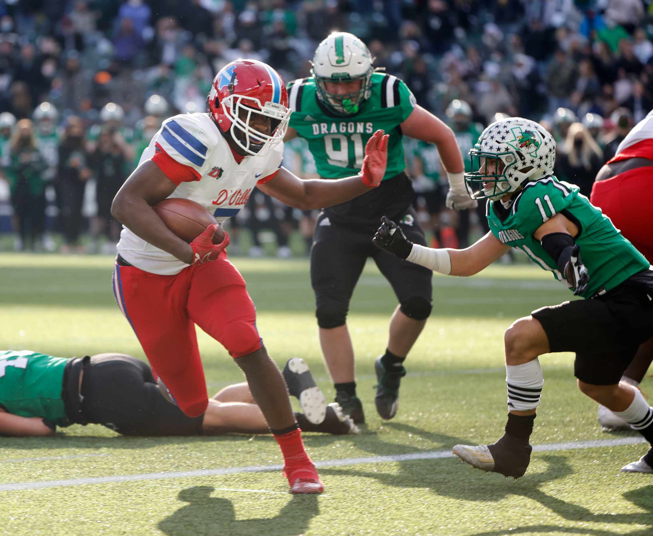 Duncanville running back Malachi Medlock (5) scores a touchdown in front of Southlake’s Josh...