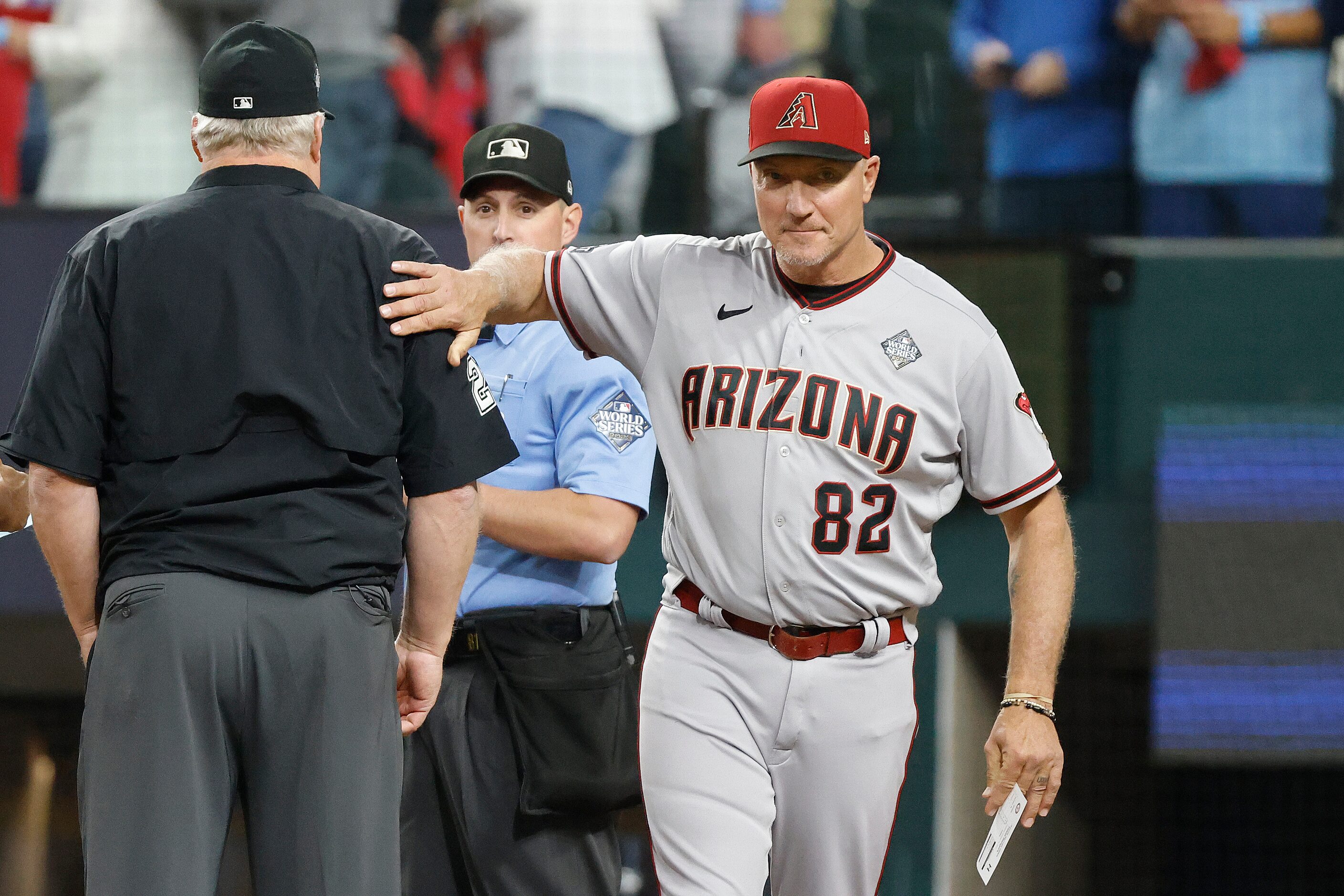 Arizona Diamondbacks bench coach Jeff Banister delivers to the lineup  before Game 2 of the...