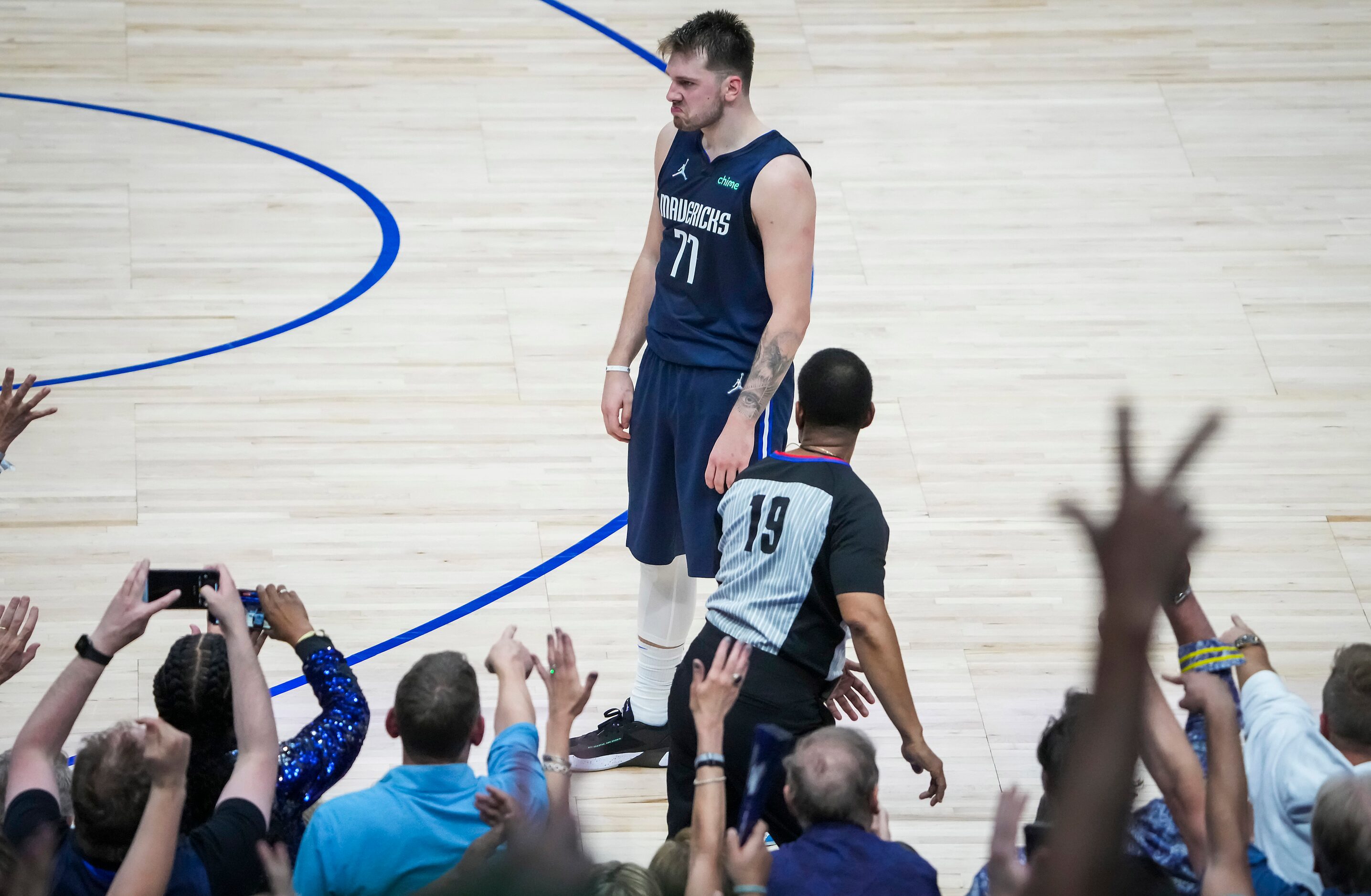 Dallas Mavericks guard Luka Doncic (77) celebrates after hitting a 3-pointer during the...