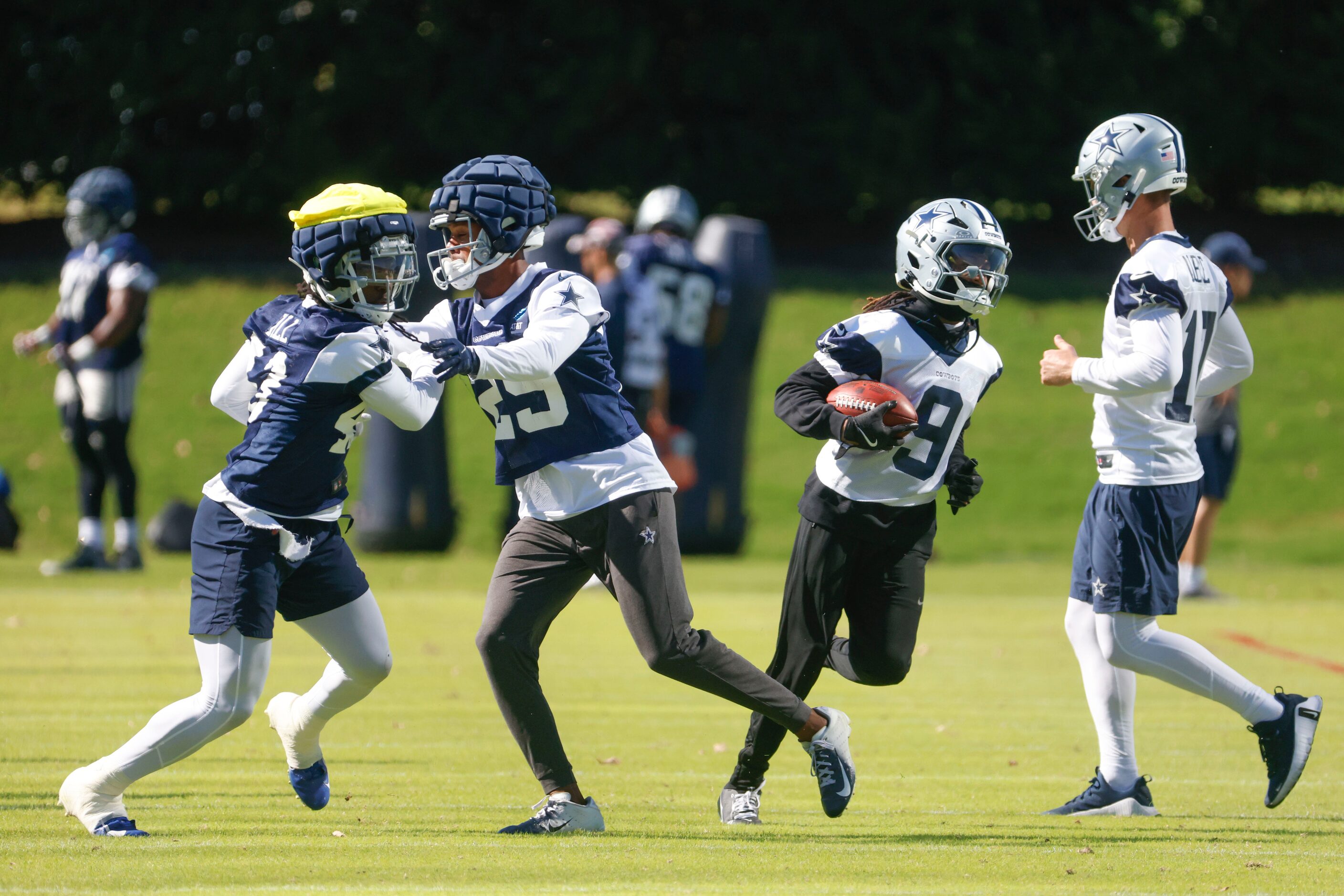 Twide receiver KaVontae Turpin (9) runs with the ball past the defense during a team...