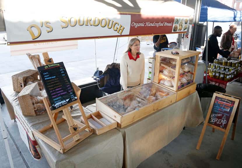 
Balch Springs baker Debra Piedra of D’s Sourdough, at her booth in The Shed, turns out...