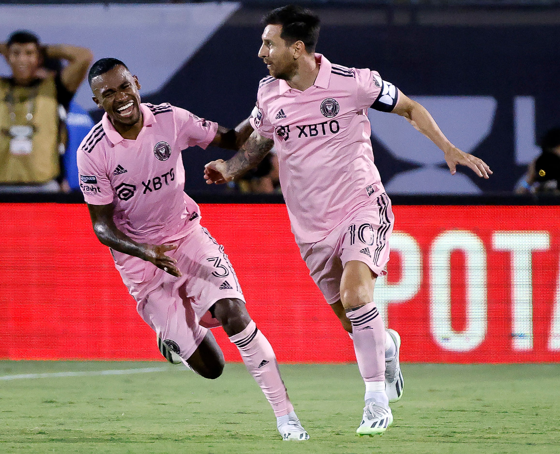 Inter Miami midfielder Dixon Arroyo (3) congratulates forward Lionel Messi (10) after he...