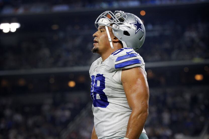 Dallas Cowboys defensive tackle Tyrone Crawford (98) is seen walking off the field against...