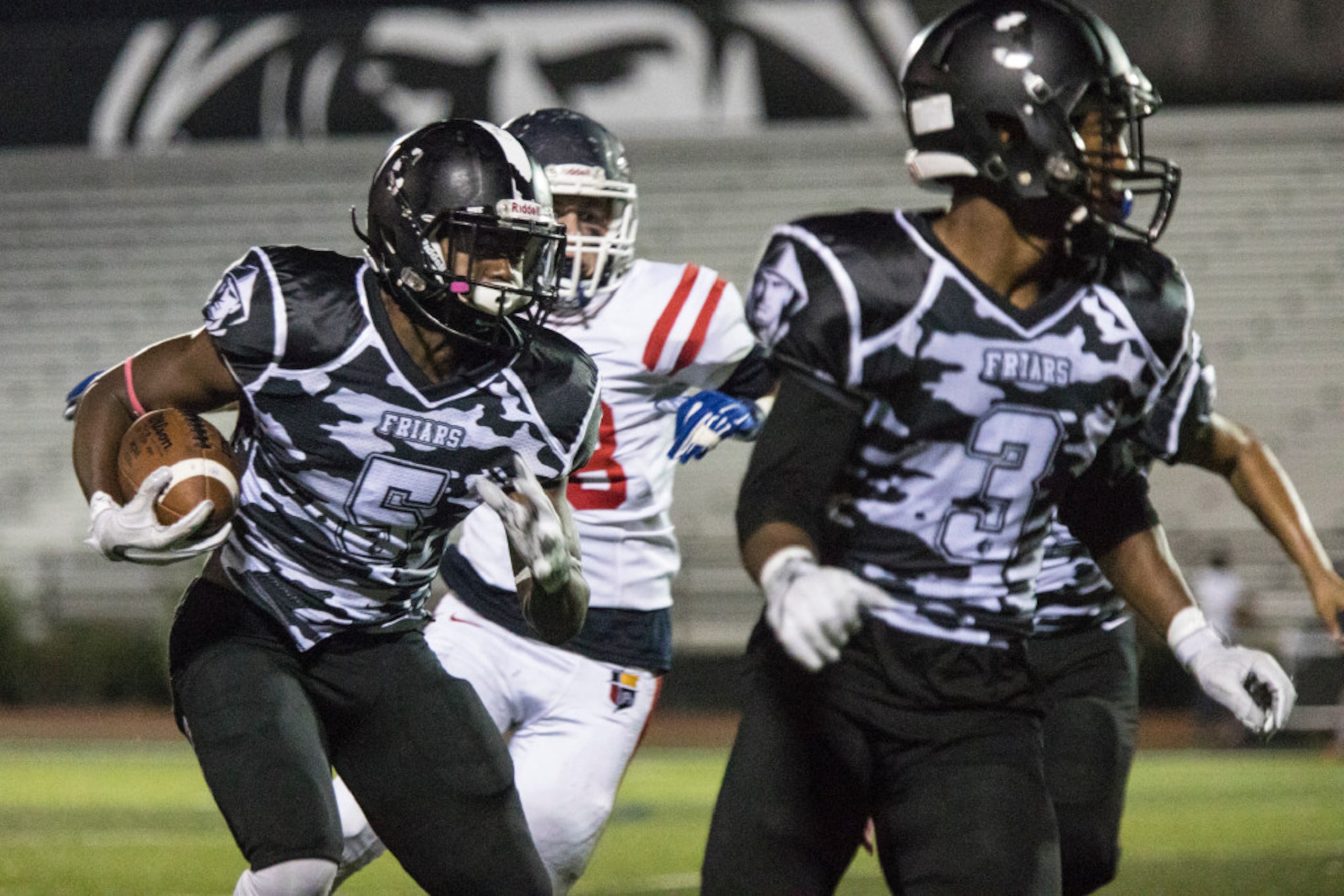 Bishop Lynch running back Jaire Moore (5) follows his blockers during Bishop Lynch's matchup...