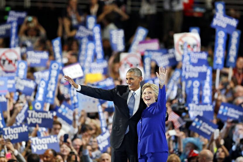 President Barack Obama and Hillary Clinton at the Democratic National Convention in...
