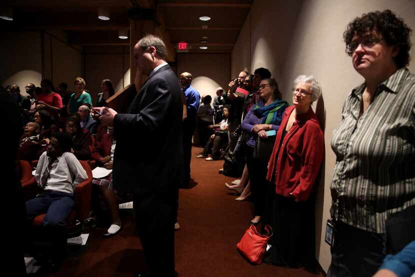 It was standing room only and an overflow crowd outside the courtroom during a meeting at...