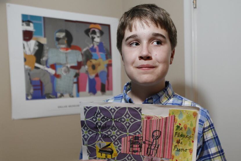 Dennis Schulze, 14, displays the art he created after being inspired by artist Romare...