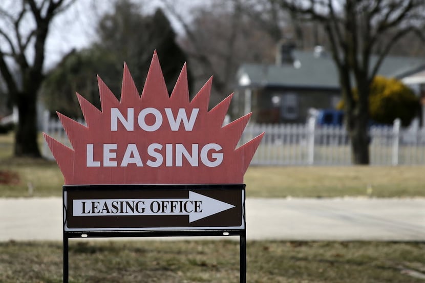 A "now leasing" sign is shown outside an apartment complex near Millville, N.J.