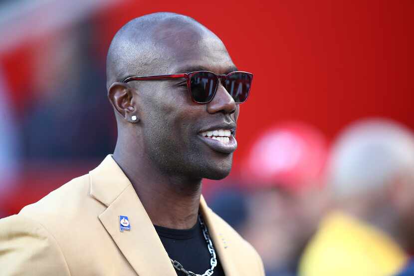 FILE - Former NFL wide receiver Terrell Owens is shown before an NFL football game between...