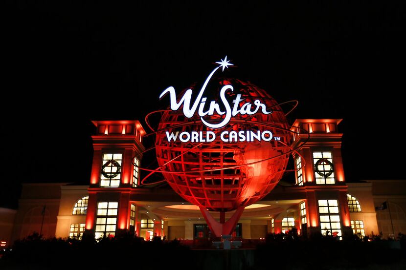 A WinStar World Casino and Resort symbol stands at the Grand Entrance on Saturday, Nov. 28,...