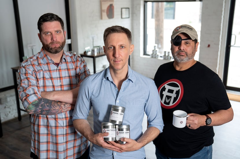 TK Kamauf, Brandon Friedman and Lance John, left to right, pose for portraits inside their...