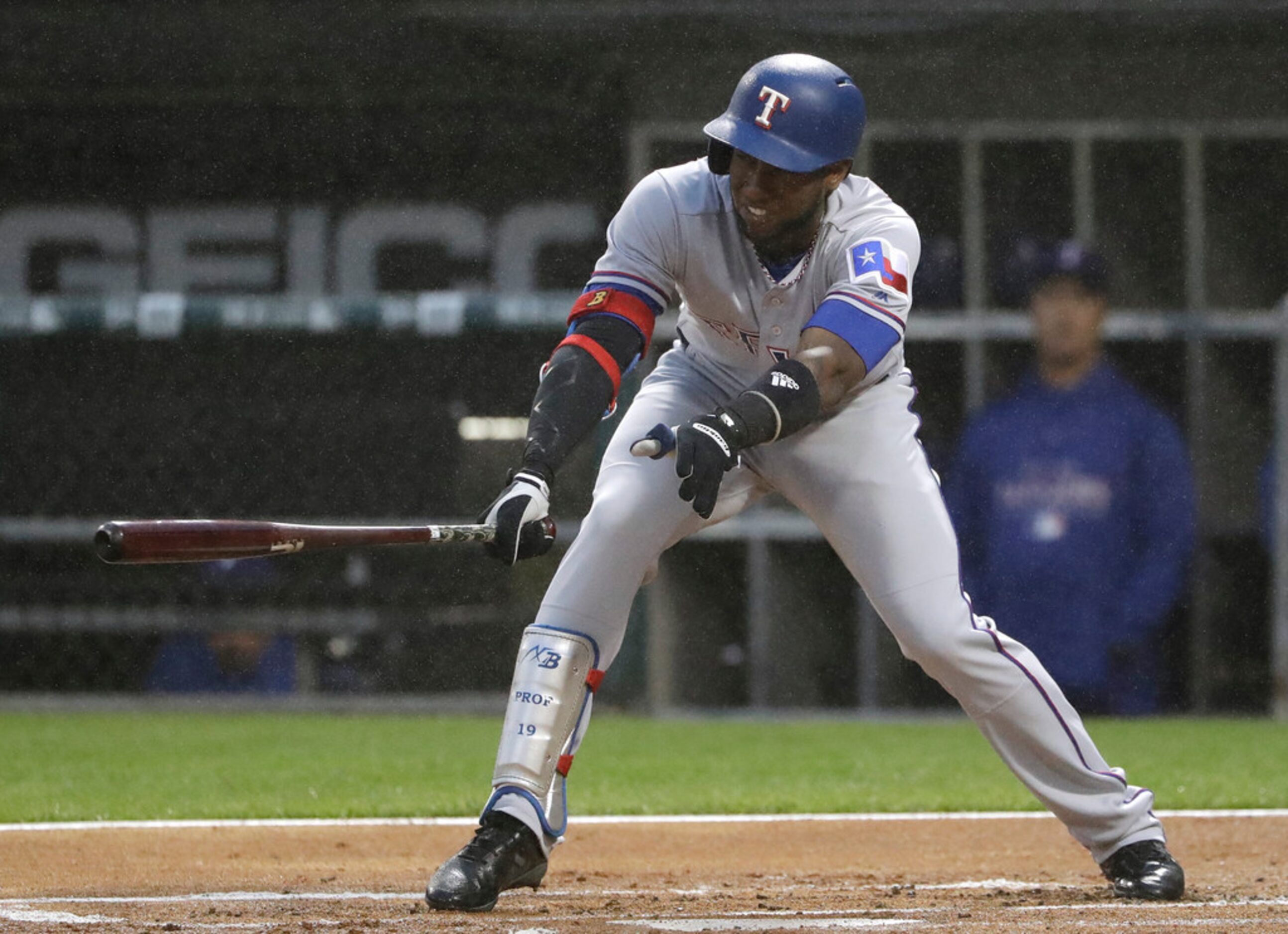 Texas Rangers' Jurickson Profar hits a two-run single against the Chicago White Sox during...