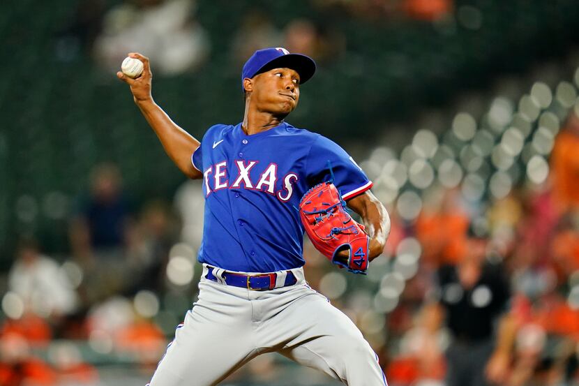 Texas Rangers relief pitcher Jose Leclerc throws a pitch to the Baltimore Orioles during the...