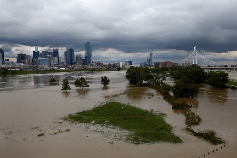 The rain-swollen Trinity River in Dallas is shown on Oct. 25, 2018. Dallas received a...