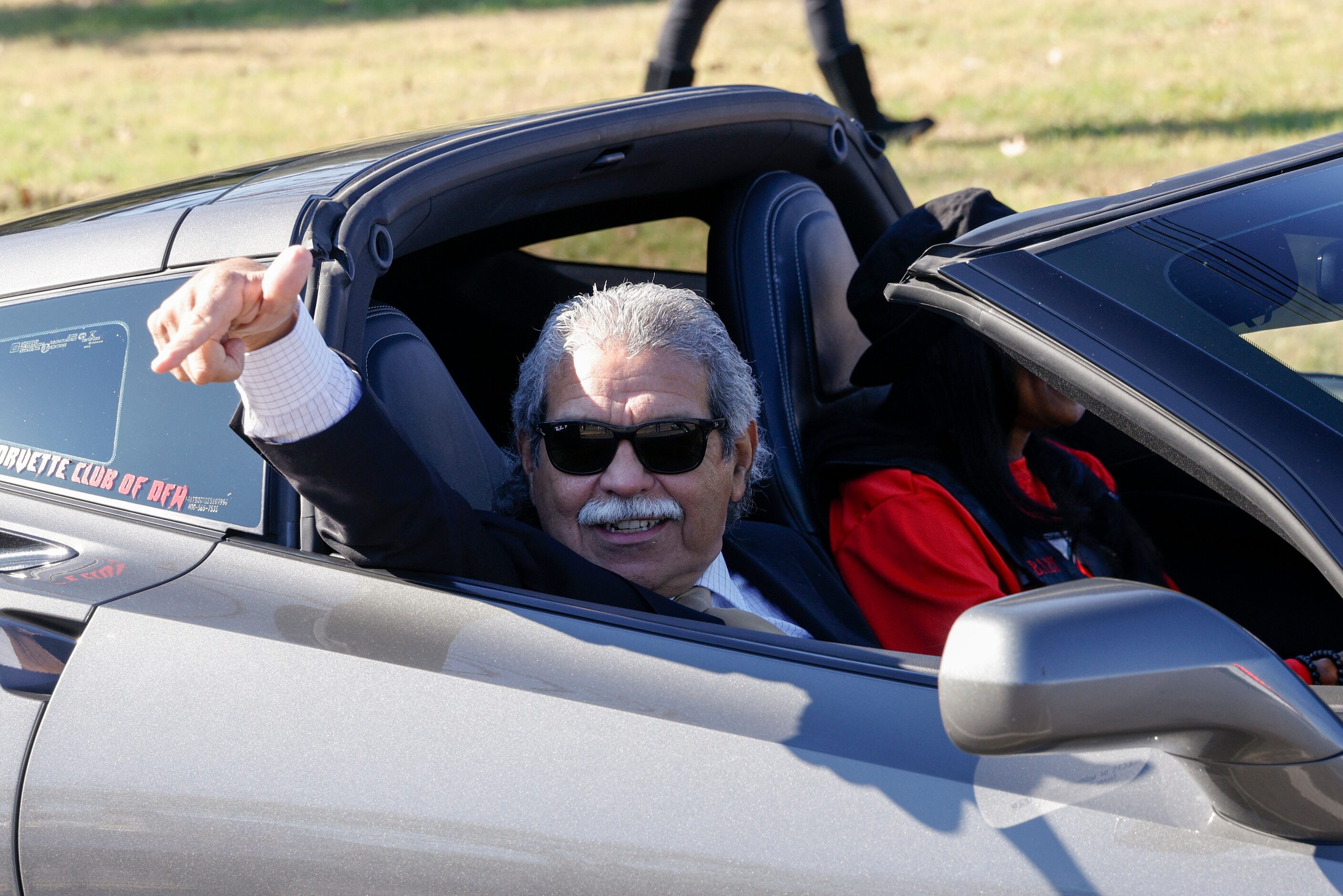 Dallas ISD Superintendent Michael Hinojosa points to the crowd during a parade celebrating...